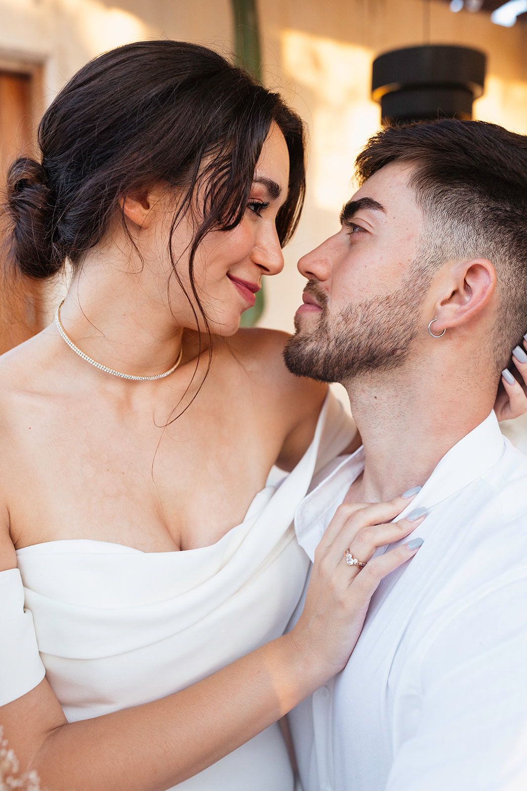 beautiful couple pose together in a tropical destination 