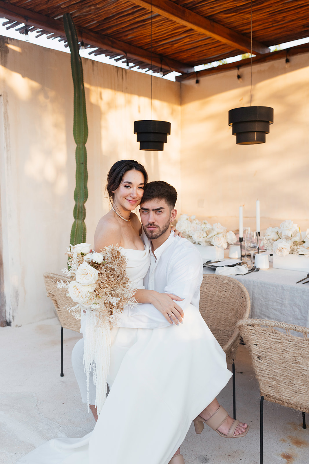 beautiful couple pose together in a tropical destination 