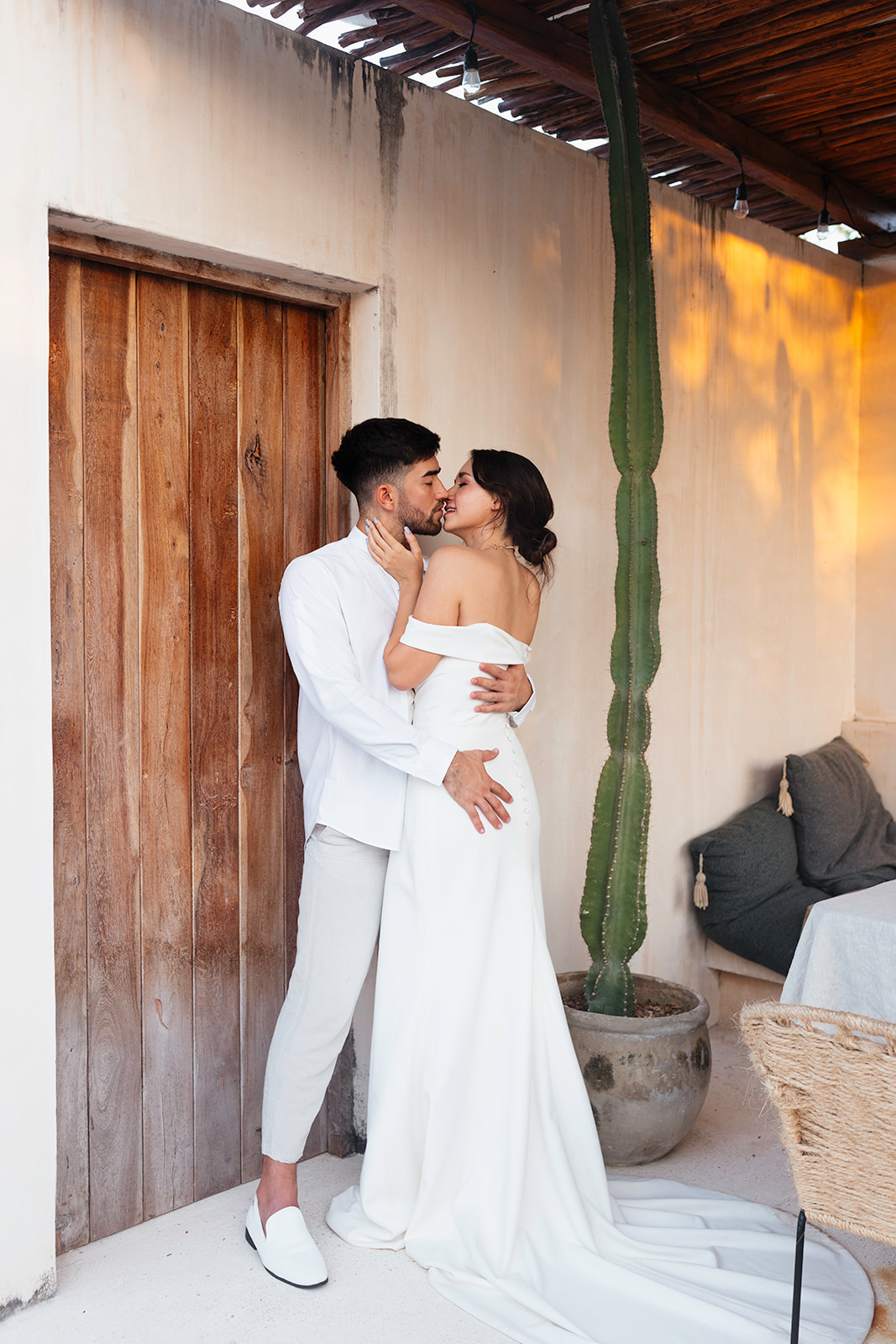 beautiful couple pose together in a tropical destination 