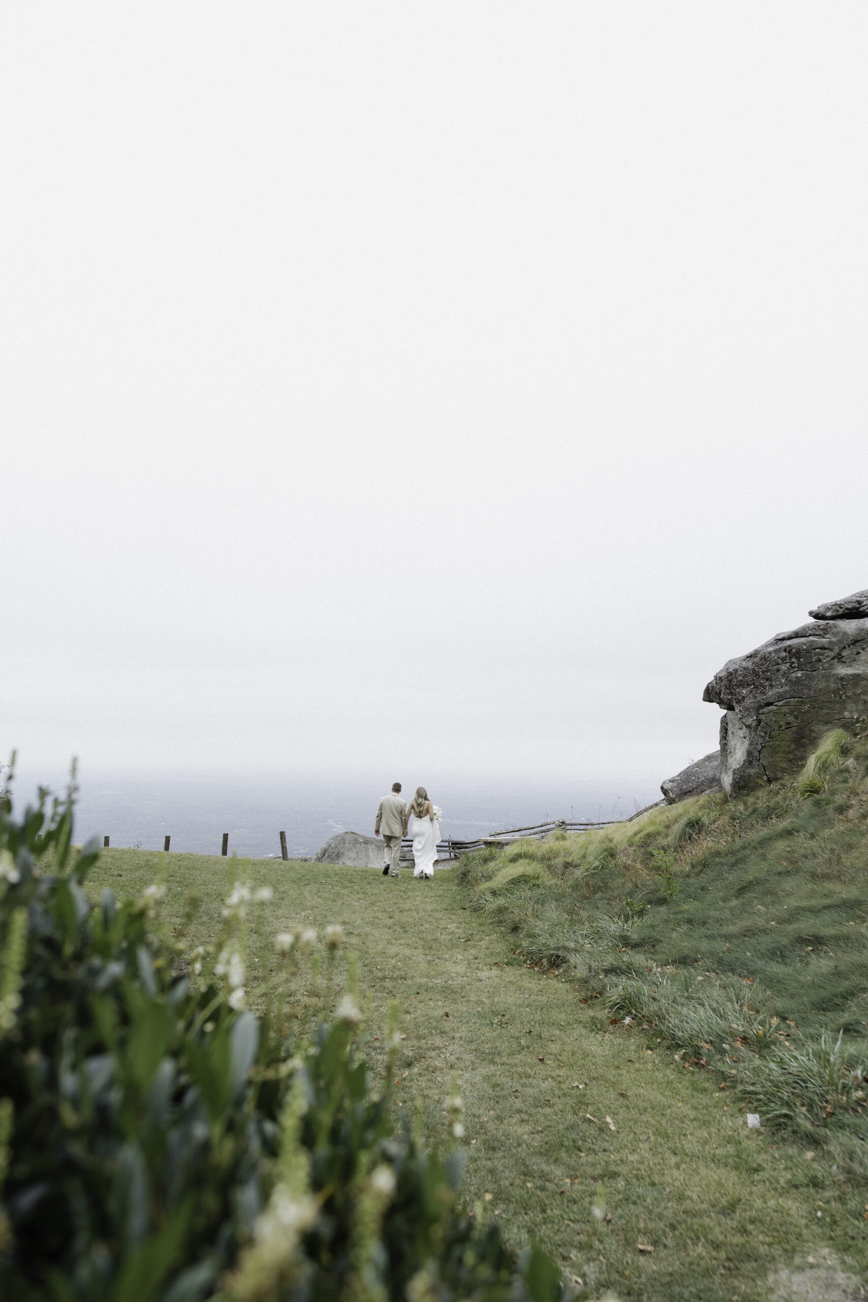 beautiful bride and groom pose together after their travel wedding!